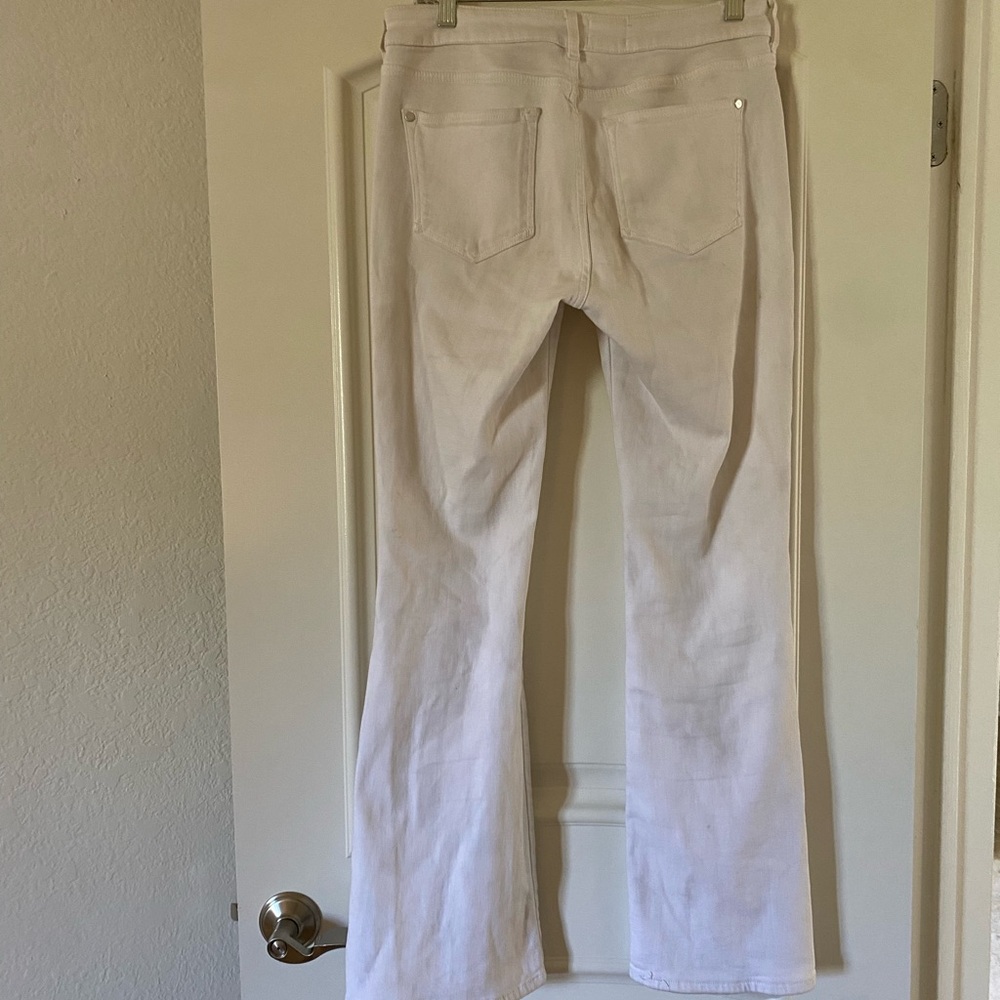 Anthropologie brand Pilcro flared white jeans